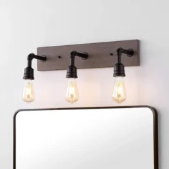 JONATHAN Y Corbett 22.13" 3-Light Rustic Farmhouse Iron LED Vanity, Oil Rubbed Bronze & Brown Wood