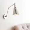 JONATHAN Y 7" Adjustable Arm Metal Rover Wall Sconce with LED Bulb - Silver 1 JONATHAN Y 7" Adjustable Arm Metal Rover Wall Sconce with LED Bulb - Silver -Jonathan Y Store GUEST 0da24b9e 65fd 4128 a59a aa7042ce8803