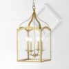 JONATHAN Y Ruth 11" Classic Metal and Glass Lantern Pendant in Antique Gold -Jonathan Y Store GUEST 2da0935e 5bc5 4e36 924f dee162917163