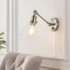 JONATHAN Y Cowie 8" Nickel LED Adjustable Wall Sconce with Clear Glass Shade -Jonathan Y Store GUEST 670a06dd 1dbe 43ea bf42 50f7cd0e5260