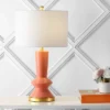 Ceramic/Iron Contemporary Glam Table Lamp (Includes LED Light Bulb) Coral/Brass - JONATHAN Y 1 Ceramic/Iron Contemporary Glam Table Lamp (Includes LED Light Bulb) Coral/Brass - JONATHAN Y -Jonathan Y Store GUEST 8545cbc2 7432 4dd8 a51c ddb83973b811
